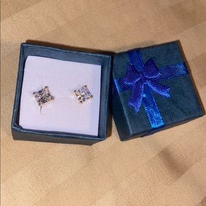 White and gold tone earring studs